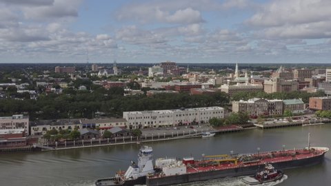 Savannah Georgia Aerial  Mid vantage panning view of downtown & Hutchinson Island waterfront cityscape - September 2018