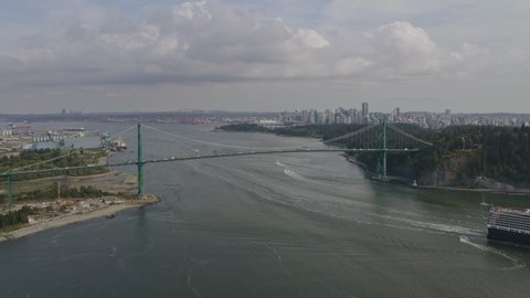 Vancouver BC Canada Aerial2 Flying toward and close to bridge, with harbour and downtown cityscape - August 2019