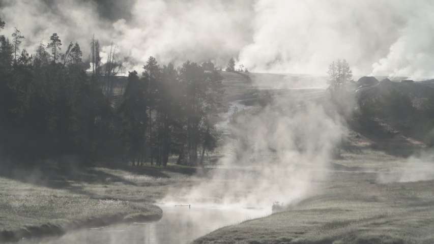 Yellowstone National Park Upper Geyser Basin. Geothermal tourist destination.