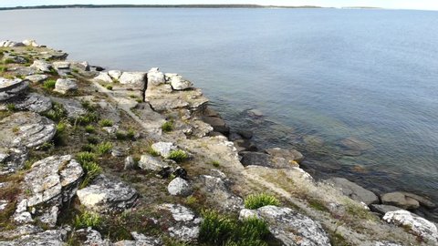 Early morning calm seas at Asunden Nature Reserve, Gotland. Aerial drone shot.