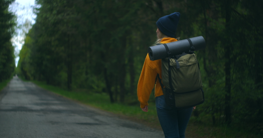 Happy Traveler With Backpacks Begins Their Journey In The Autumn Sunny Forest