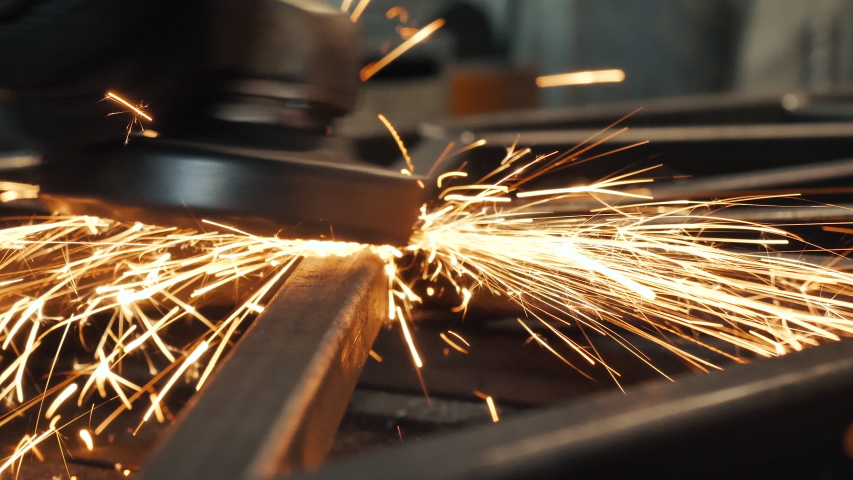 Grinding Work with Smooths Equipment for Steel Metal, Iron, Sparks at Manufacturing Heavy Industry Factory Closeup Indoor. Metalwork Assembly, Heat Detail Welding by Professional Laborer Using Grinder Royalty-Free Stock Footage #1056997295