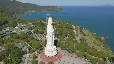 Aerial shot of the famous travel destination Son Tra Linh Ung Pagoda also known as Ledy Buddha in the city of Da Nang in central Vietnam. Travel to Vietnam concept. The City of Da Nang is the new