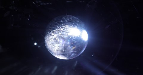 
lights hitting the disco ball