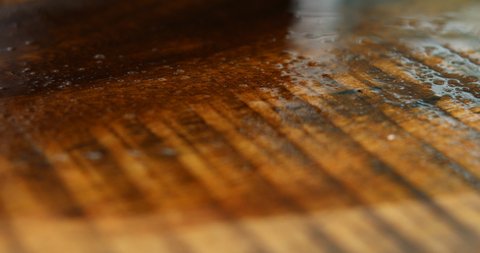 The carpenters paint the varnish with lacquer to protect the wood surface from being damaged.