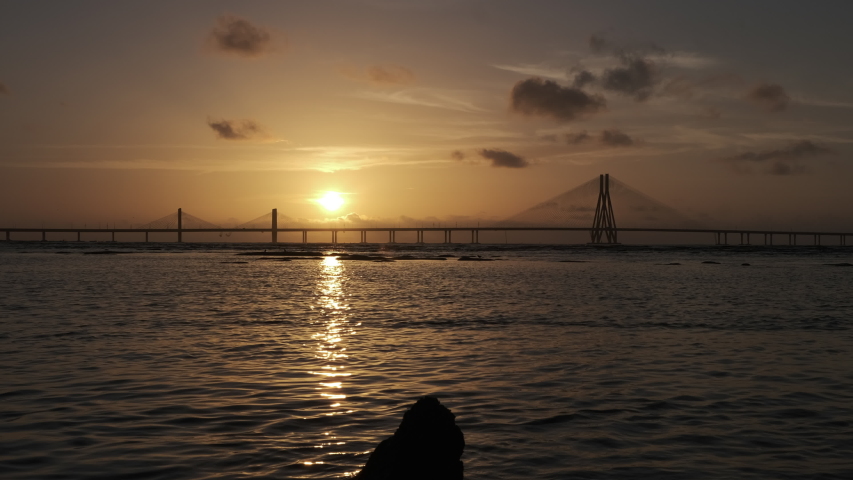 Cinematic Time lapse footage of Sunset at Bandra Worli sea link also known as Rajiv Gandhi Sea link, Mumbai, India. 4k