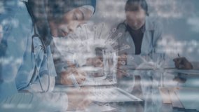 Animation of covid-19 cell floating and data processing over view of multi ethnic female healthcare workers working in a hospital. Coronavirus Covid-19 pandemic concept digital composite. - Powered by Shutterstock - Get 15% off with code: PIKWIZARD15