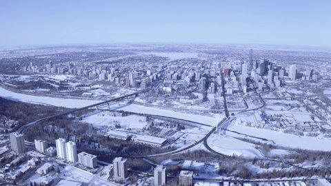 Winter Snow covered Capital City Edmonton Alberta Edmonton Super high Aerial view of the Saskatchewon river the Walter Dale Bridge with the High Level bridge that connect to the downtown core