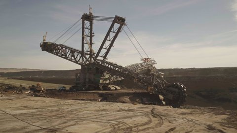 A large bucket-wheel excavator in a lignite (brown-coal) mine aerial view