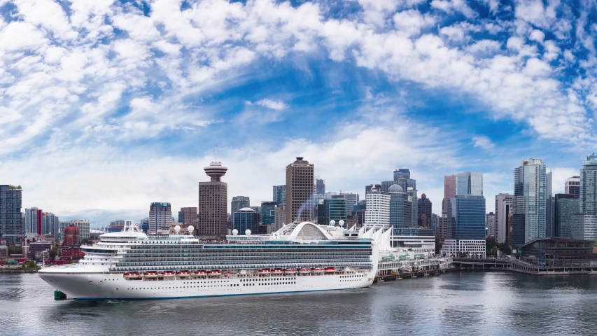 Cinemagraph Continuous Loop Animation. Vancouver, British Columbia, Canada. Panoramic View of Downtown City Skyline, Coal Harbour, Cruise Ship and Port during a sunny day.