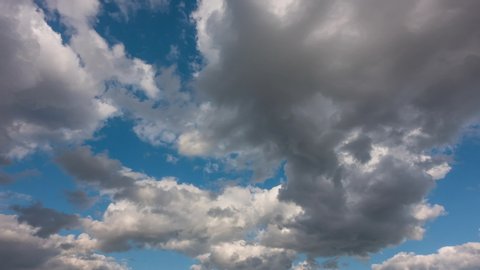 Beautiful blue sky with clouds background. Sky clouds. Sky with clouds weather nature cloud blue. Blue sky with clouds and sun. Loop.