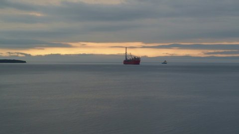 CONCEPTION BAY SOUTH, NEWFOUNDLAND AND LABRADOR, CANADA – AUGUST 2, 2020. The Terra Nova offshore floating oil platform and supply ship en route to Europe, taken on August 2, in Conception Bay South.