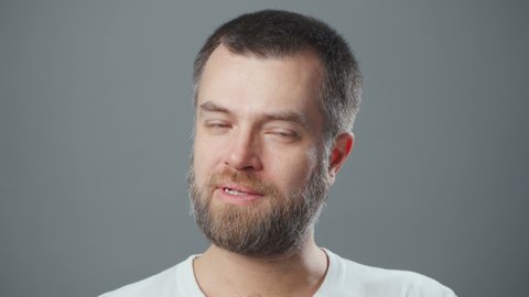 Video of bearded skeptical man