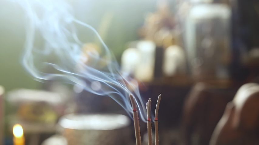 Incense stick smoke, Buddhist rituals | Shutterstock HD Video #1057179949