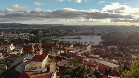 Epic aerial view of the Anosy lake in Antananarivo, Madagascar, and the surroundings district like Mahamasina, famous travel destination in the Indian ocean