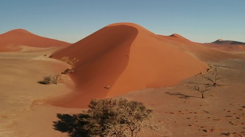 Aerial of Dune 45 near Sesriem Sossuvlei national park in Namibia, famous touristic photo spot for sunset, with a view on the surroundings composed of giant dunes