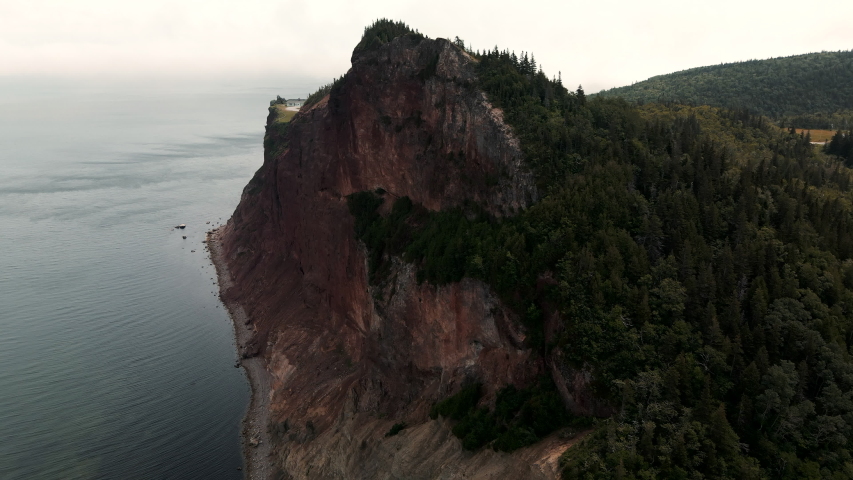 The Beautiful Tourist Attraction In Perce City Quebec Canada With Steep Cliff - Aerial Shot