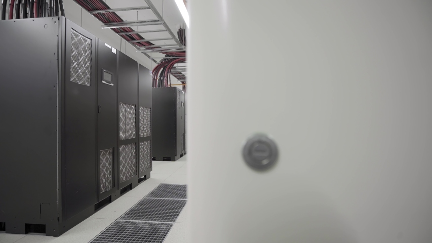 Tracking shot. Hi-tech UPS battery room at large data center. Royalty-Free Stock Footage #1057194457