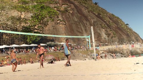 Rio de Janeiro , Rio de Janeiro / Brazil - 07 19 2020: Sports at Leme beach with foot volley at the end of Copacabana boulevard