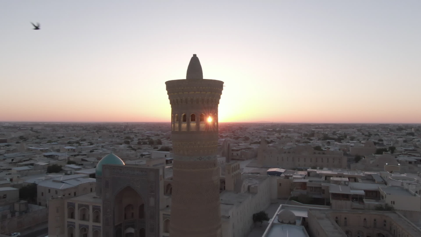 Po-i-Kalyan mosque complex in Bukhara and Kalyan Minaret at sunset, shot by a drone | Shutterstock HD Video #1057204585