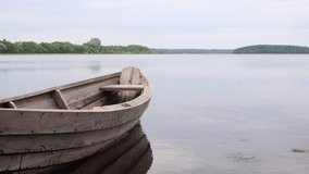 Boat on a calm summer lake. Relax video with nature. Zen meditative nature background