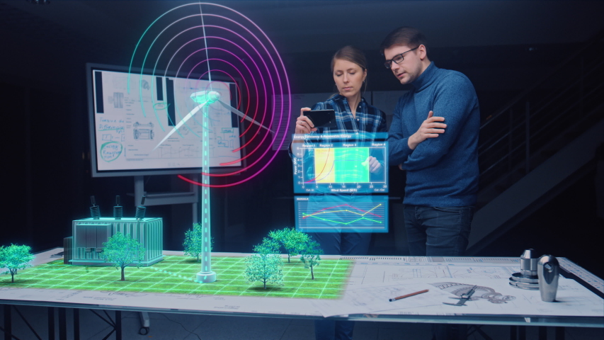 Renewable Energy Engineers Design 3D Wind Turbine Park Using Augmented Reality Hologram and Smartphone. Specialists Use Virtual Reality App to Work on Green Energy Environmental Power Production Royalty-Free Stock Footage #1057229617