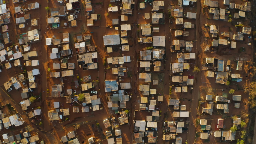 Poverty.Inequality.Straight down aerial view of the densly over crowded and populated Mamelodi African township(squatter camp), South Africa Royalty-Free Stock Footage #1057238644