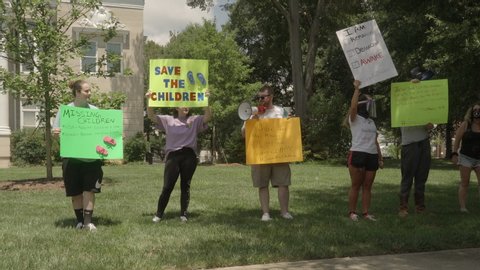 Shelby, N.C./ USA-08/08/2020: A group of protesters gather to bring awareness to child trafficking, abuse, murder and satanic ritual abuse by the elites.
