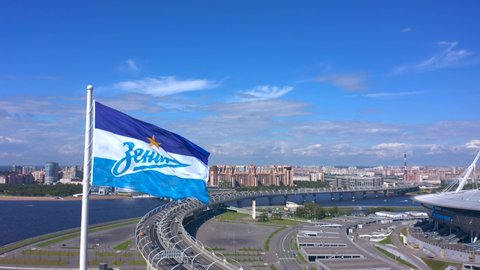 SAINT PETERSBURG, RUSSIA - AUGUST 7, 2020: Aerial view of the flag of Zenit - the main football team of St. Petersburg. Drone flight over the city. Zenit Arena Stadium, Gazprom Arena.