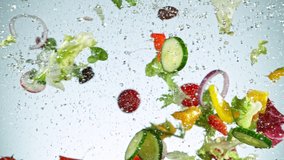 Super Slow Motion Shot of Flying Fresh Vegetables. Shot with high speed cinematic camera, super slow motion at 1000 fps. - Powered by Shutterstock - Get 15% off with code: PIKWIZARD15