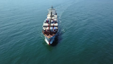 commercial ships sailing offshore oil stains, containers