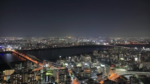 Time-lapse night view of Osaka skyline from Umeda Sky building observatory. 