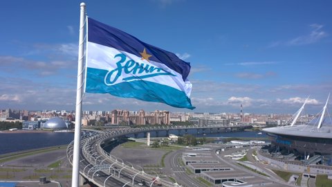 SAINT PETERSBURG, RUSSIA - AUGUST 7, 2020: Aerial view of the flag of Zenit - the main football team of St. Petersburg. Drone flight over the city. Zenit Arena Stadium, Gazprom Arena.
