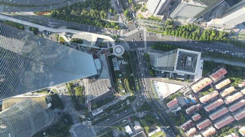Aerial view of Shanghai downtown Lujiazui financial district drone top view cityscape. Cozy drone point of view footage. Tourism travel business financial concept. Skyscrapers city street urban view.