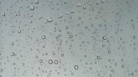 Rainwater drops Falling Down On the Window Glass, Rain Drops On The Windows Glass, and Macro shot of water droplets falling.
 - Powered by Shutterstock - Get 15% off with code: PIKWIZARD15