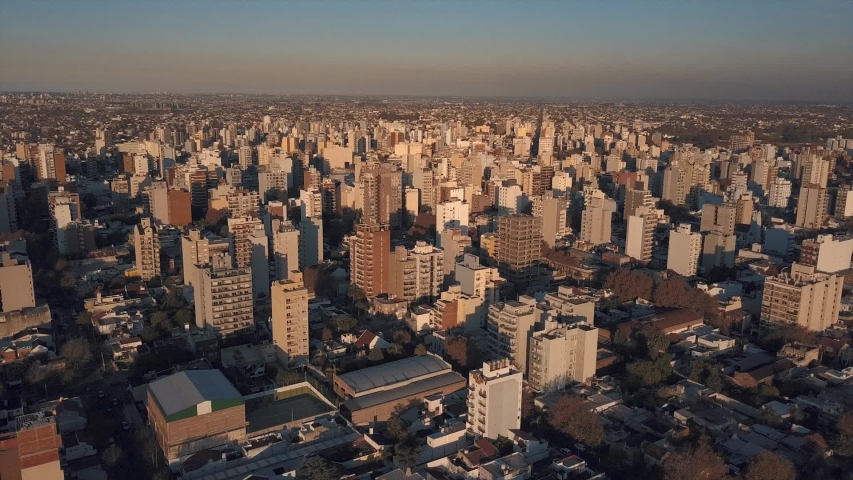 Aerial shots of the city of Buenos Aires, the suburbs at sunset. | Shutterstock HD Video #1057354888