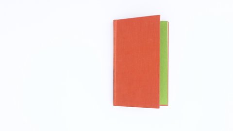 6k orange book appear and open. Stop motion 