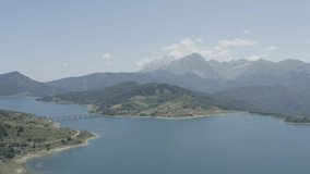 aerial view of lake campotosto in the mountain area of gran sasso italy and monti della laga abruzzo video not edited color d-logm