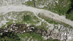 aerial view of a stretch of the Arno torrent in the mountain area of the gran sasso italy abruzzo edited video