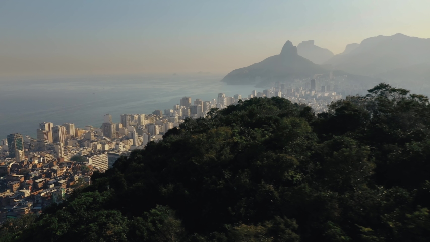 Aerial View Of Cantagalo Hill, Ipanema And Rio De Janeiro Mountain Skyline, Sunset Royalty-Free Stock Footage #1057376341