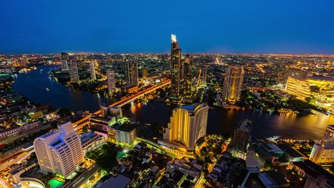 day to night time lapse of Bangkok city with Chao Phraya River, Thailand