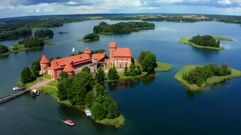 Trakai castle: medieval gothic Island castle, located in Galve lake. Flat lay of the most beautiful Lithuanian landmark. Trakai Island Castle - one of the most popular tourist destination in Lithuania
