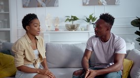 African american young married people experience family crisis having misunderstanding conflict arguing with each other in living room. Home quarrel. Relationships. - Powered by Shutterstock - Get 15% off with code: PIKWIZARD15