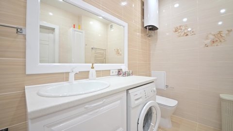 Russia, Moscow- February 10, 2020: interior room apartment modern bright cozy atmosphere. general cleaning, home decoration, preparation of house for sale, bathroom, sink, decor elements, toilet