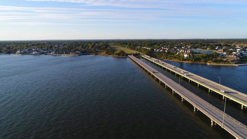 This video shows views aerial views of the Robert Moses Causeway Bridge in Long Island, NY. The Robert Moses Causeway is an 8.10-mile-long parkway in Suffolk County, New York, in the United States. Th