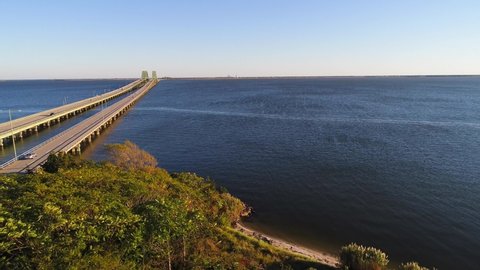 This video shows views aerial views of the Robert Moses Causeway Bridge in Long Island, NY. The Robert Moses Causeway is an 8.10-mile-long parkway in Suffolk County, New York, in the United States. Th