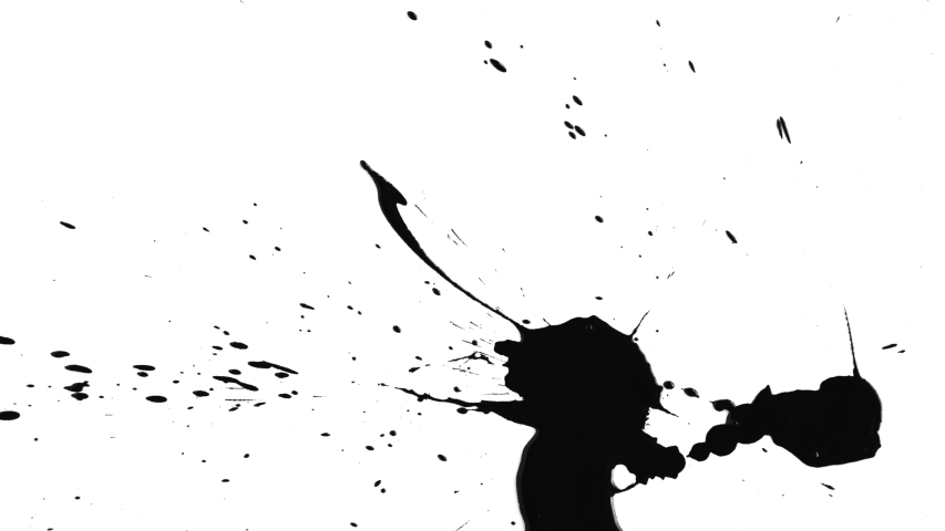 A solo splat of ink on surface from below shot in 4k from the Hisan collection - Ink VFX Video Element.