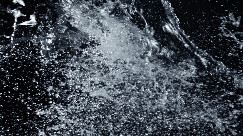 Super Slow Motion Shot of Side Water Splash Isolated on Black Background at 1000fps. | Shutterstock HD Video #1057401121