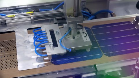 Solar Cell Tabbing And String Machine On The Conveyor In Photovoltaic Factory