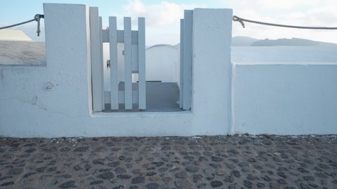 Pov enter into house yard in Oia, Santorini
